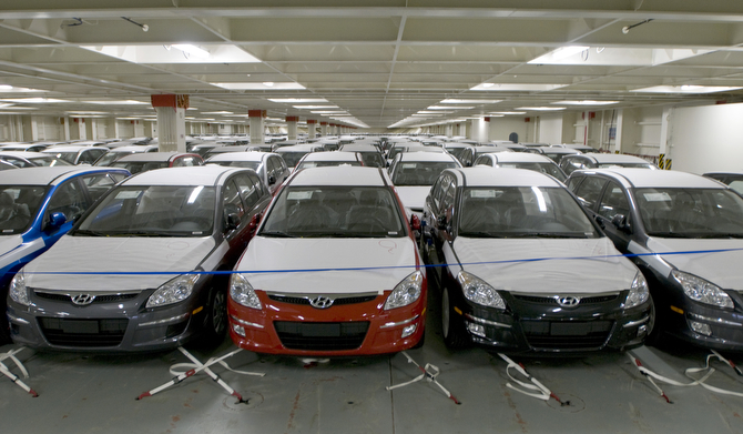 Cars secured inside of a Ro/Ro shipping vessel, reading for shipping overseas.