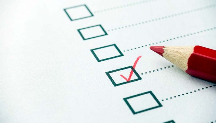 Checklist with Red Pencil