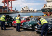 Australian Customs performing biosecurity checks on a shipment of classic cars at a shipping port in Sydney.