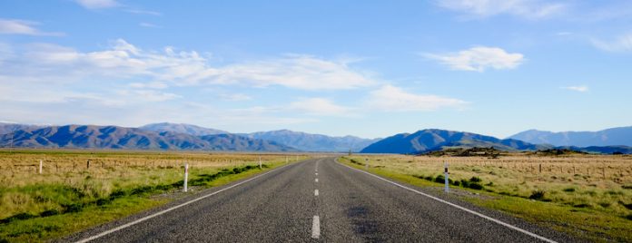 Highway 8, the road between Lake Tekapo and Lake Pukaki in the South Island, during spring season of New Zealand.