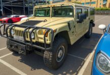 From Surrey to the States – Shipping a 2006 Hummer H1 Alpha to Brunswick, USA via RoRo Front view of a beige Hummer H1 Alpha shipped by Autoshippers from Dorking, UK, to Brunswick, USA.