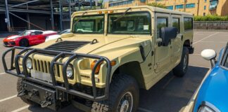 Front view of a beige Hummer H1 Alpha shipped by Autoshippers from Dorking, UK, to Brunswick, USA.