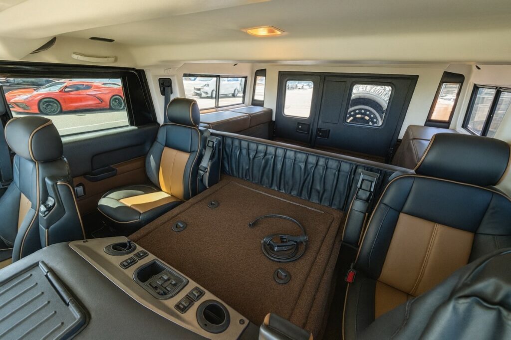 Rear leather seats and central tunnel of the Hummer H1 Alpha shipped by Autoshippers from Dorking, UK, to Brunswick, USA.