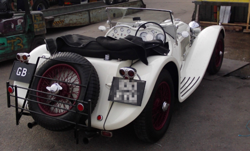 Rear view of a 1976 Suffolk Jaguar SS100 Convertible replica shipped from the UK to New Zealand by Autoshippers